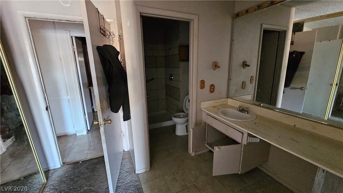 6777 Ledgewood Drive, Las Vegas, NV 89103 A spacious bathroom layout presents an opportunity for a custom renovation project.