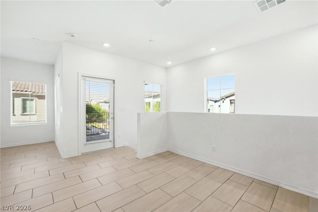 Gleaming tile floors and clean white walls create a serene, open atmosphere.