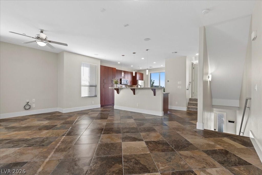 9050 W Tropicana Avenue, #1170, Las Vegas, NV 89147 Great room with custom tile floors.