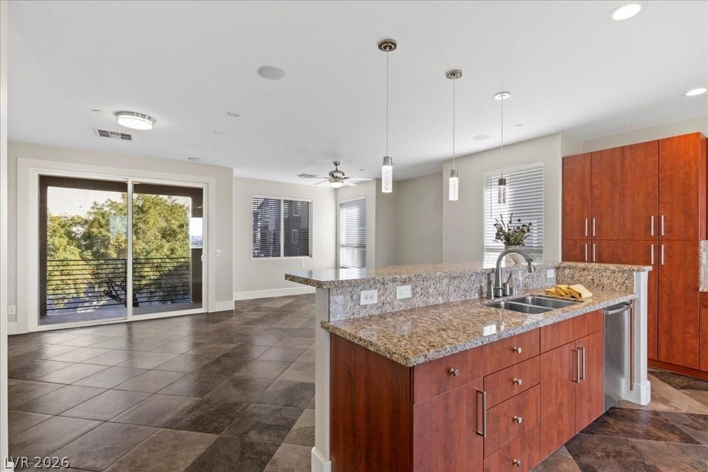 9050 W Tropicana Avenue, #1170, Las Vegas, NV 89147 Breakfast bar/island with chiseled edge granite.