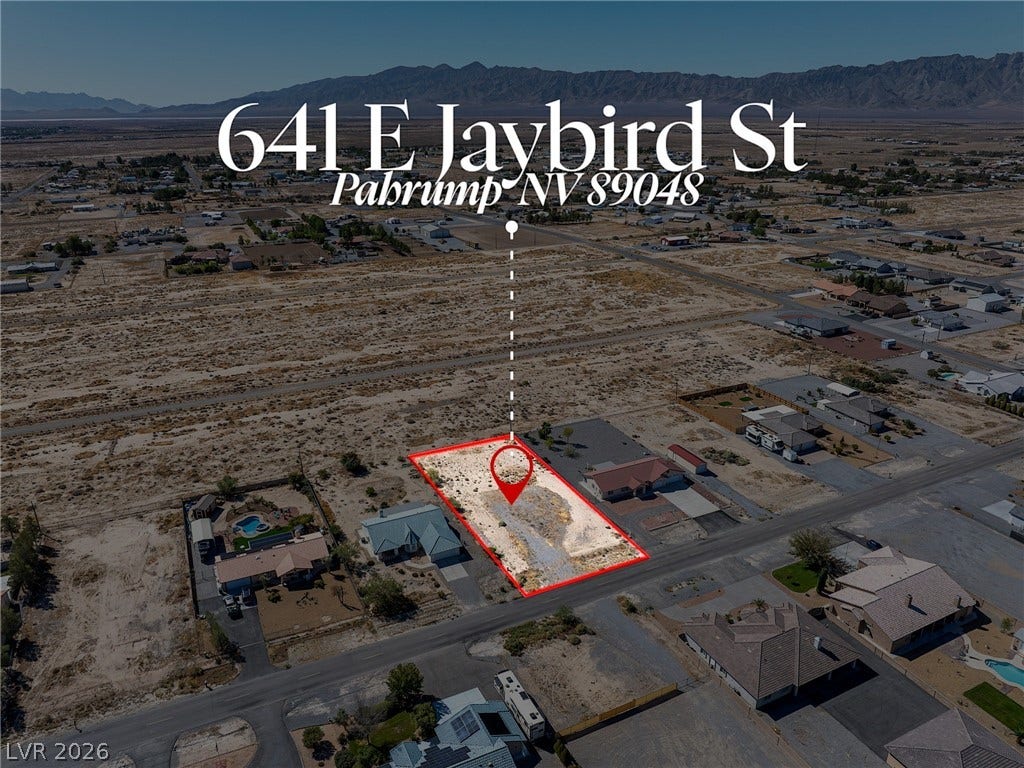 641 E Jaybird Street, Pahrump, NV 89048 Distant mountains frame this residential lot nestled in a quiet desert neighborhood.