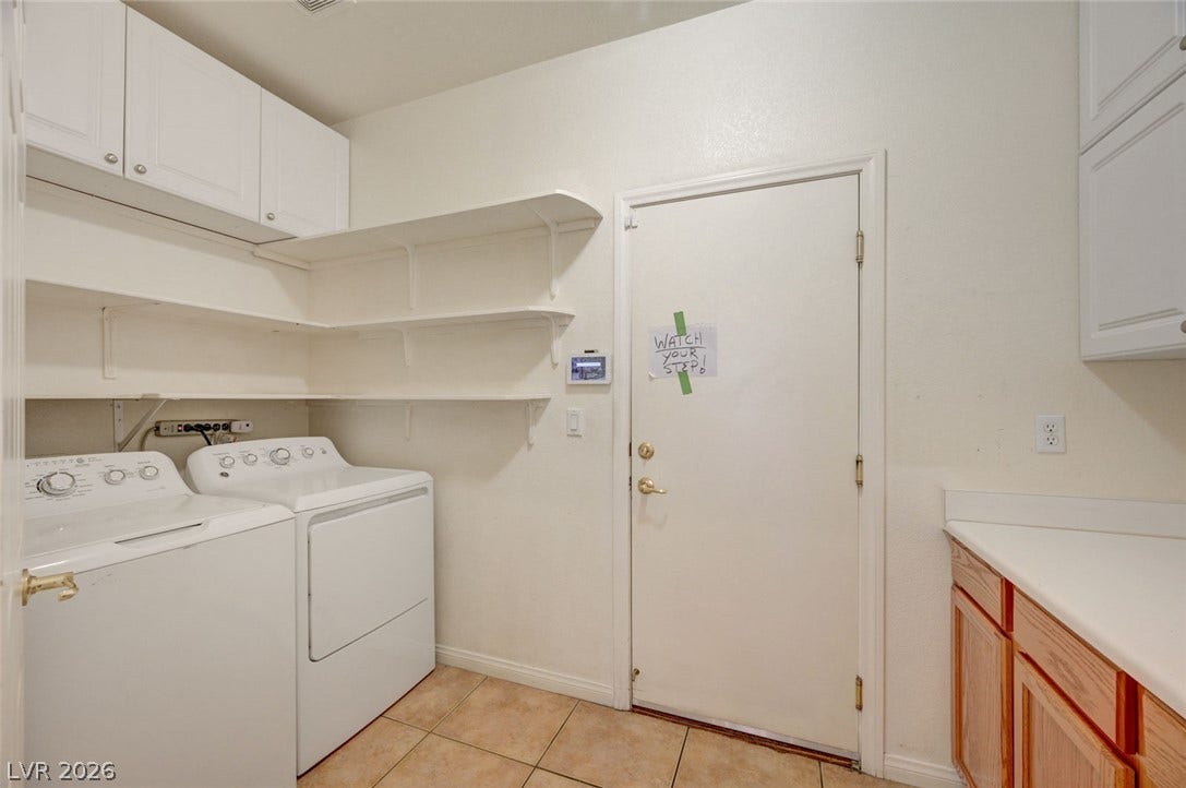 849 Ashford Way, Henderson, NV 89015 Ample storage solutions in this practical laundry space.