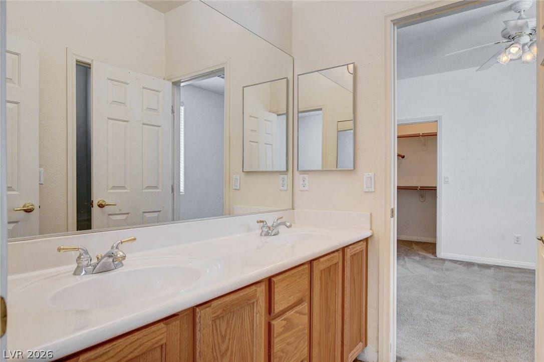 849 Ashford Way, Henderson, NV 89015 Double vanity with ample counter space creates a functional and organized bathroom.