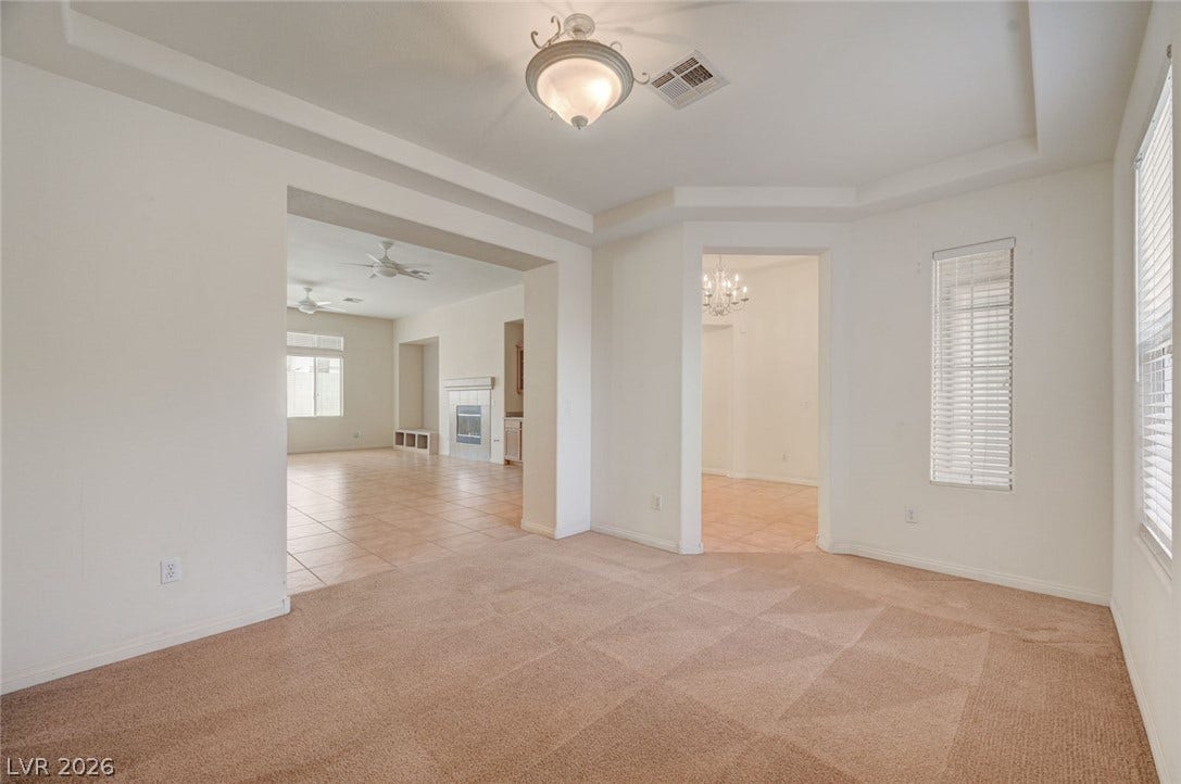 849 Ashford Way, Henderson, NV 89015 A versatile open-plan interior with mixed flooring offers adaptable living spaces.