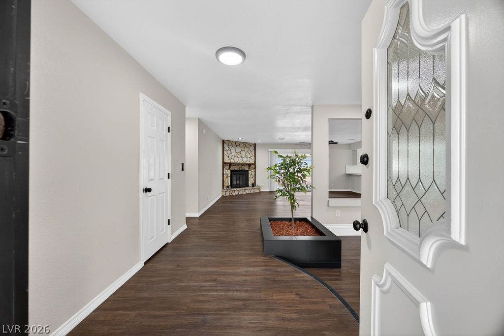 3189 Casanova Circle, Las Vegas, NV 89120 An inviting entryway leads directly into a spacious open layout with durable wood-look flooring.