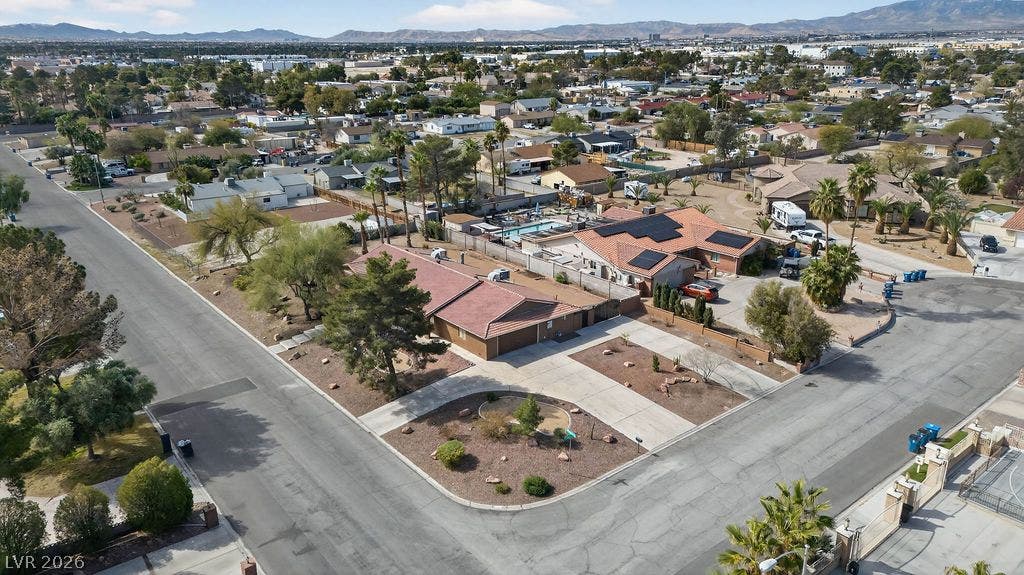 3189 Casanova Circle, Las Vegas, NV 89120 An aerial perspective showcases the corner lot setting with mountain views on the horizon.