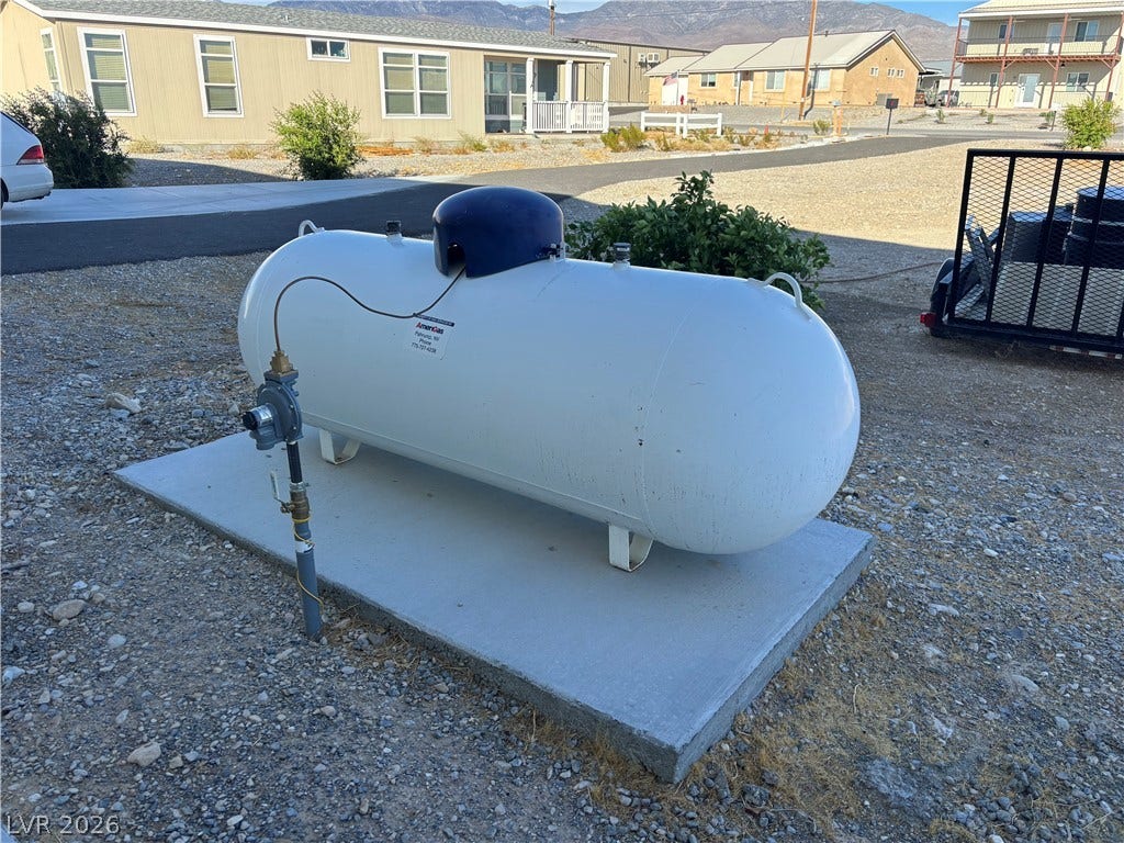 A private utility system is installed securely on a concrete pad.