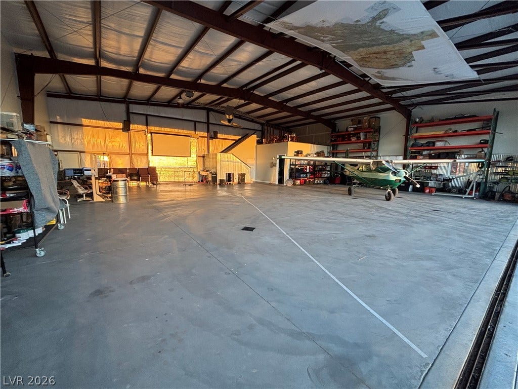 Massive concrete flooring under high vaulted ceilings defines this versatile industrial structure.