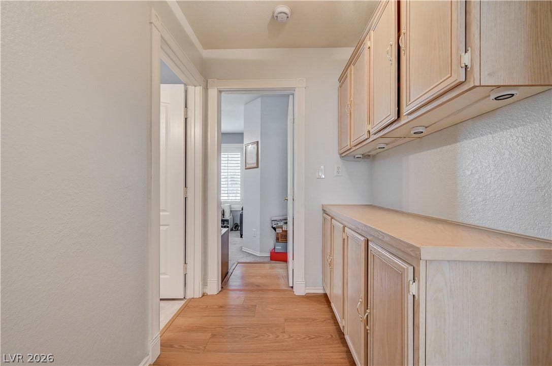 5413 Painted Mirage Road, Las Vegas, NV 89149 Guest room separate hallway from Primary lots of cabinets