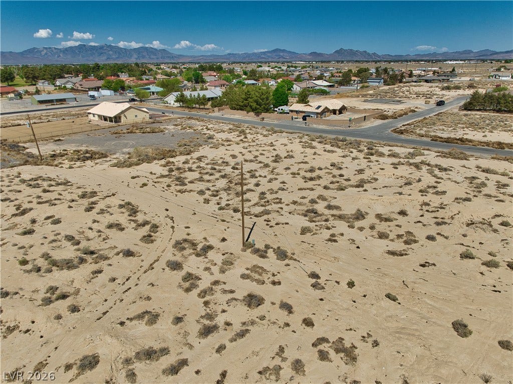 Drone / aerial view with a mountain view and a residential view