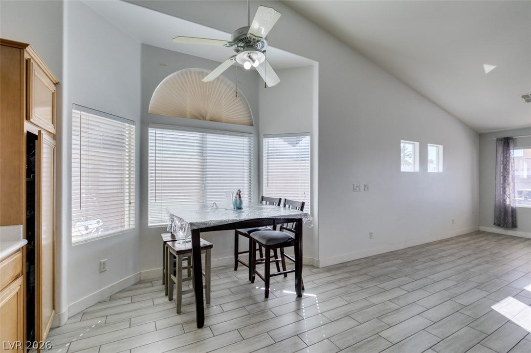 6543 Mahogany Peak Avenue, Las Vegas, NV 89110 Vaulted ceilings and tile flooring enhance this open-concept dining area.