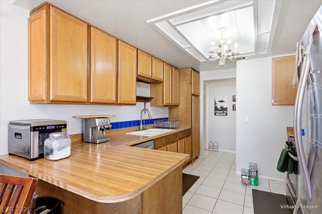 3960 Grapefruit Circle, Las Vegas, NV 89103 Virtually staged to remove clutter.