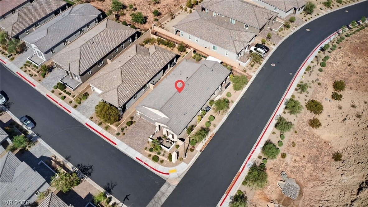 4 Bobado Lane, Henderson, NV 89011 An aerial perspective showcases the classic tiled rooflines of this modern neighborhood development.