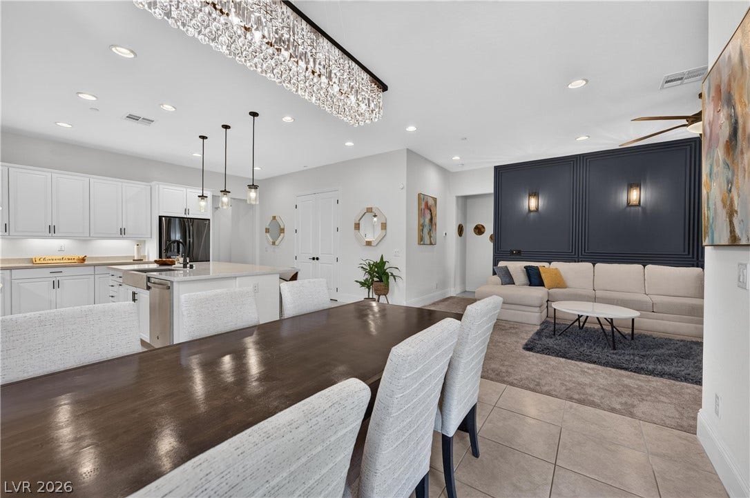 4 Bobado Lane, Henderson, NV 89011 Polished tile flooring transitions seamlessly from the formal dining space to the open kitchen.