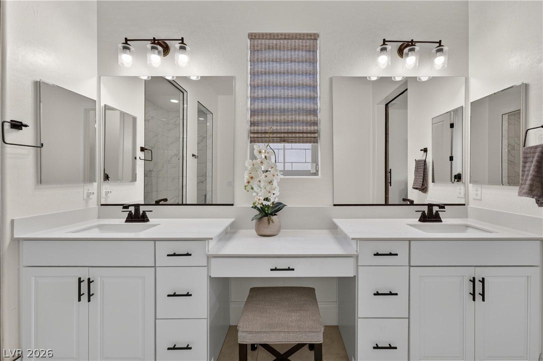 4 Bobado Lane, Henderson, NV 89011 Clean lines and a spacious dual vanity define this modern main bath design.