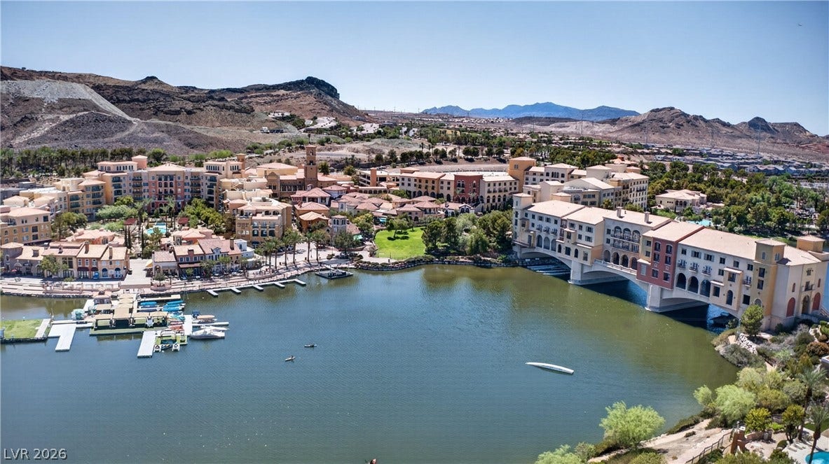 4 Bobado Lane, Henderson, NV 89011 Scenic water views and surrounding mountain ridges define this peaceful lakeside community location.