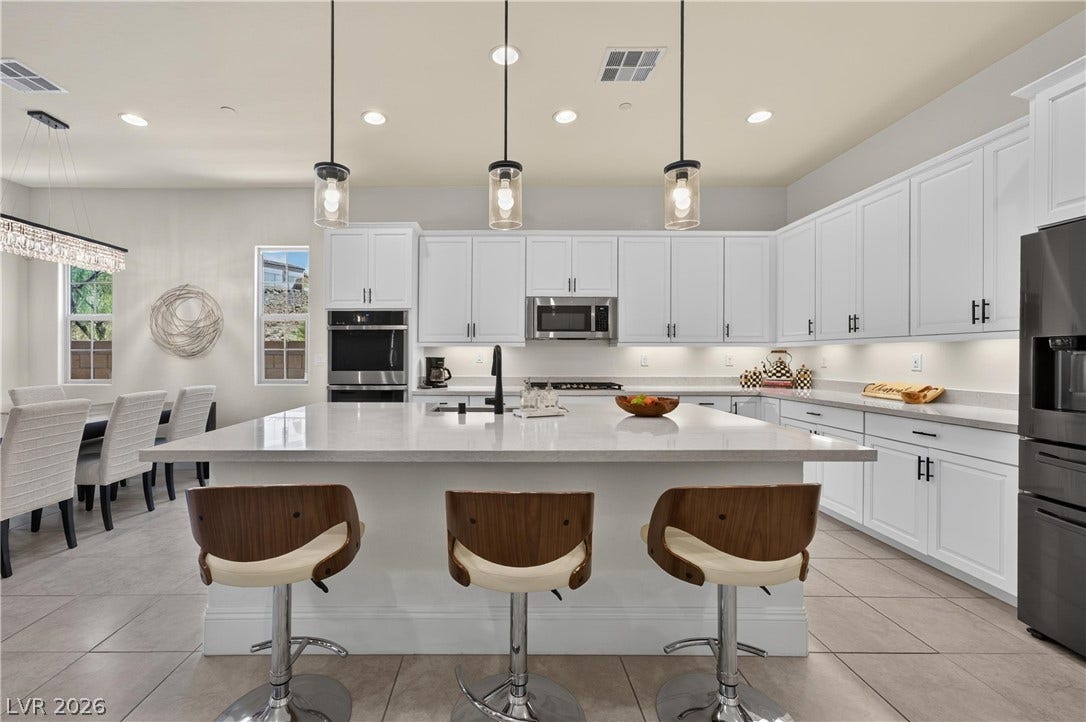 4 Bobado Lane, Henderson, NV 89011 Clean lines and a spacious center island define this modern culinary workspace.