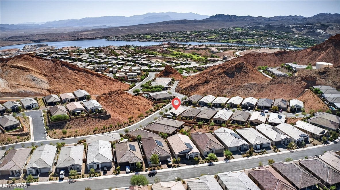 4 Bobado Lane, Henderson, NV 89011 Dramatic desert ridges and mountain vistas frame this master-planned community near the water.