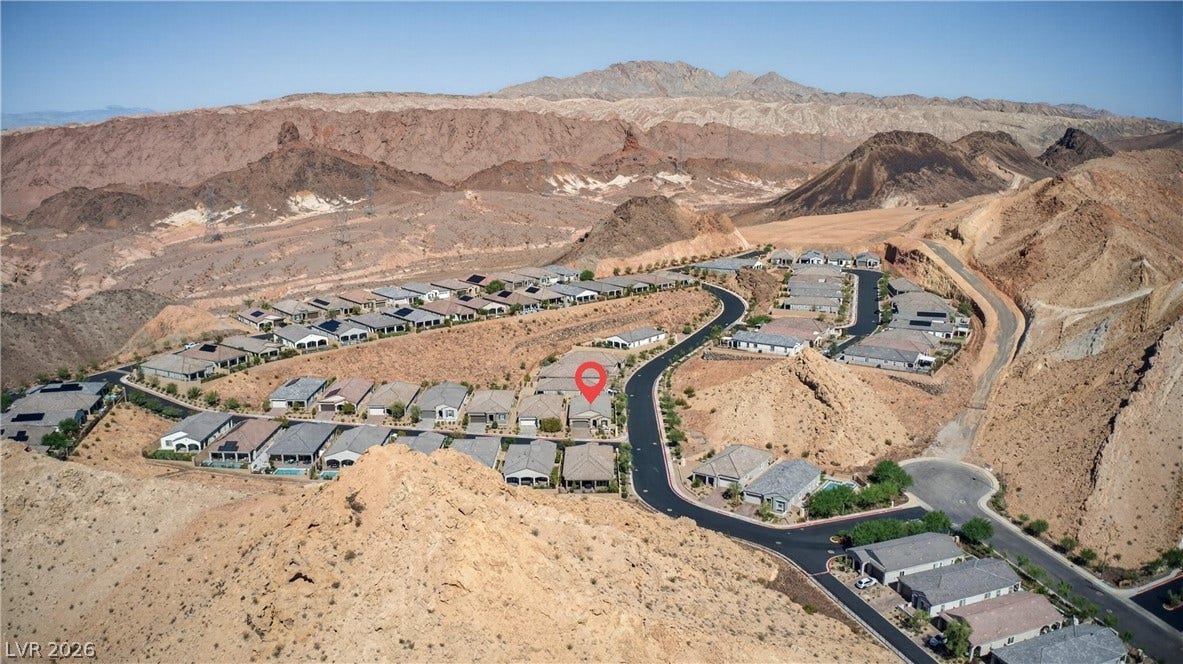 4 Bobado Lane, Henderson, NV 89011 Dramatic mountain ridges frame this desert community of modern single-story homes.