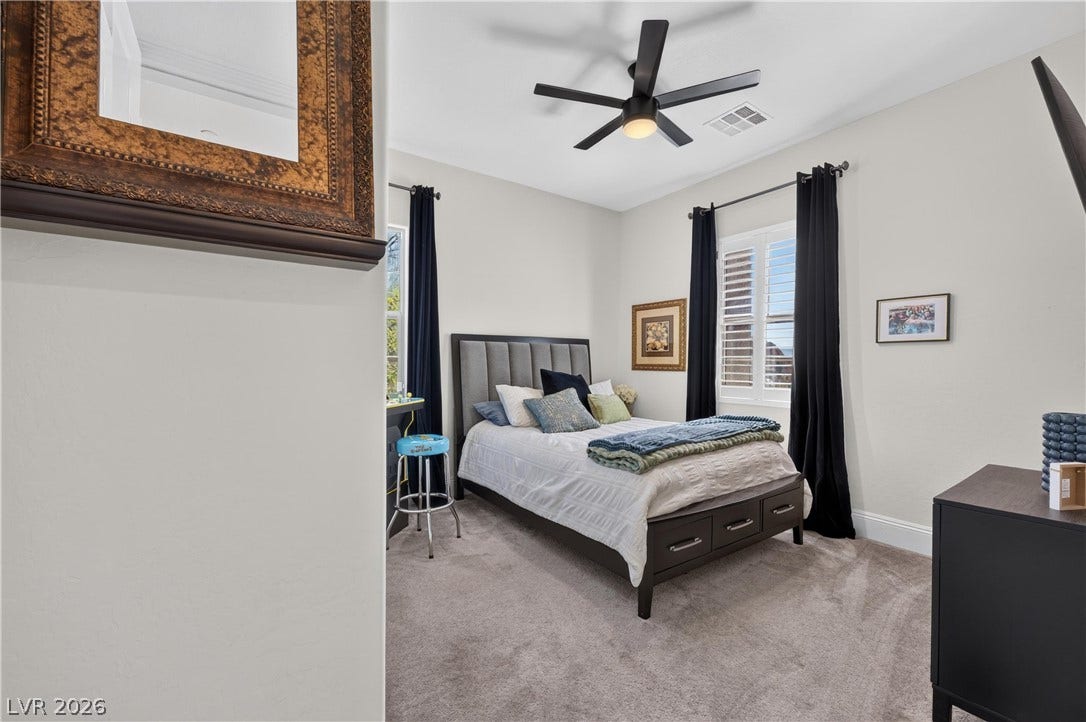 4 Bobado Lane, Henderson, NV 89011 Plush carpeting and plantation shutters define this comfortable, light-filled bedroom retreat.