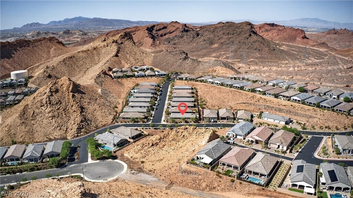 4 Bobado Lane, Henderson, NV 89011 Dramatic mountain vistas surround this hillside residential neighborhood.
