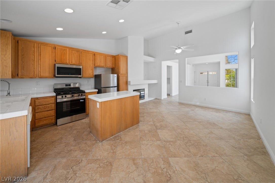 Kitchen and dining area shown as vacant