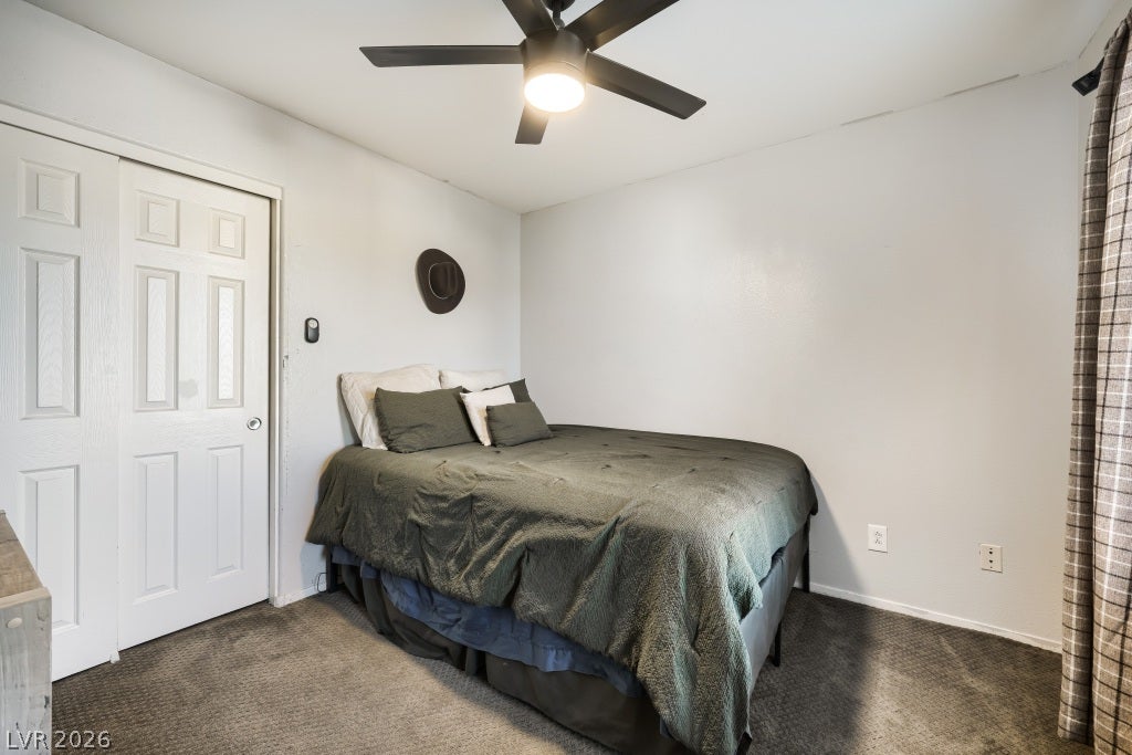 2099 Lost Maple Street, Las Vegas, NV 89115 Soft carpeting underfoot creates a cozy environment inside this peaceful bedroom.