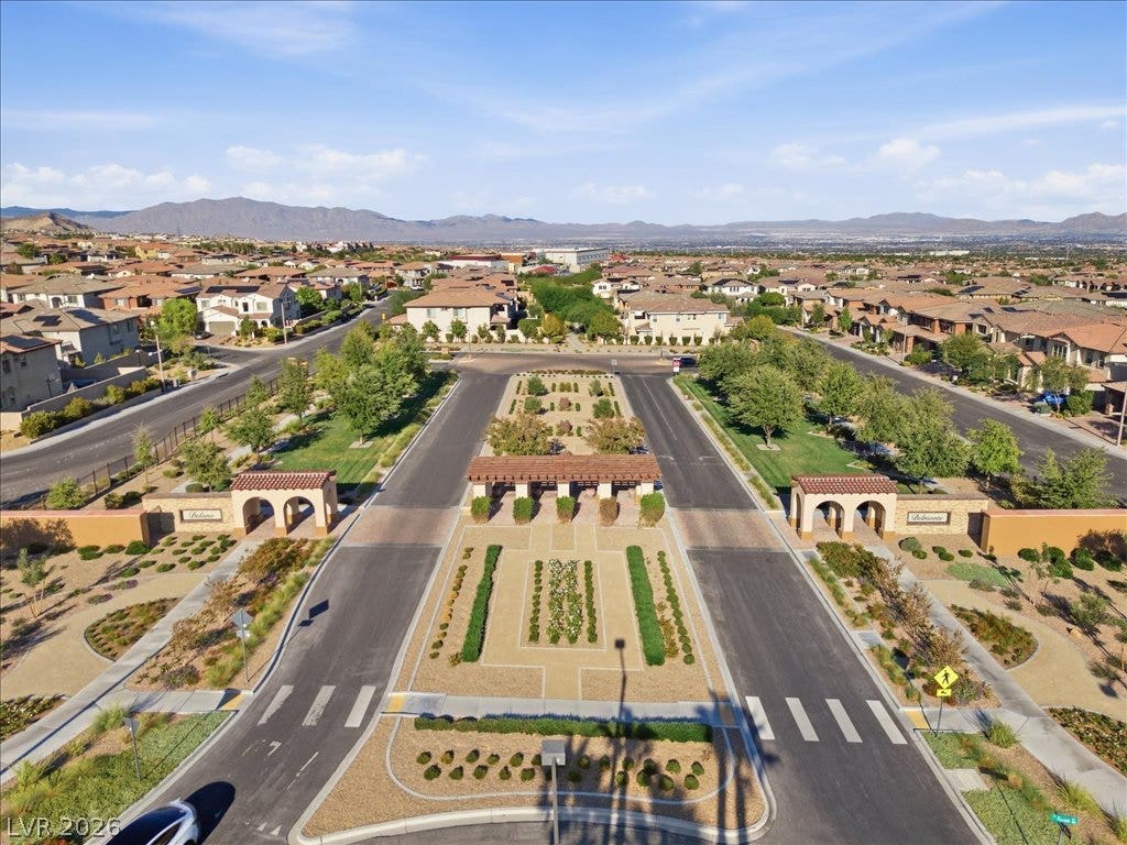 181 Elder View Drive, Las Vegas, NV 89138 A grand, landscaped entrance sequence welcomes residents to this master-planned suburban community.