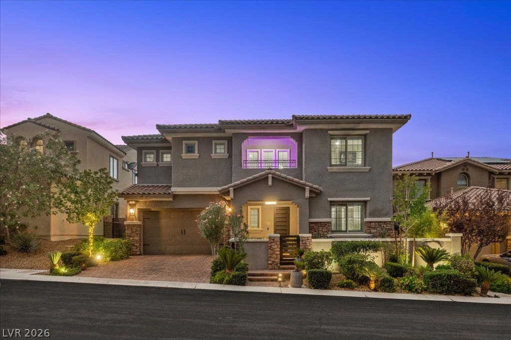 181 Elder View Drive, Las Vegas, NV 89138 Striking contemporary architecture pairs with refined stone accents and manicured desert landscaping.