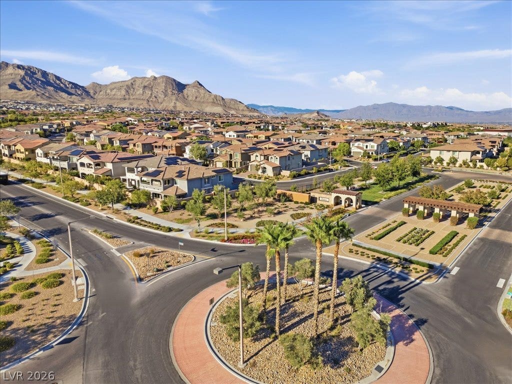 181 Elder View Drive, Las Vegas, NV 89138 Majestic mountain ridges frame a beautifully planned suburban neighborhood centered around a quiet landscaped roundabout.