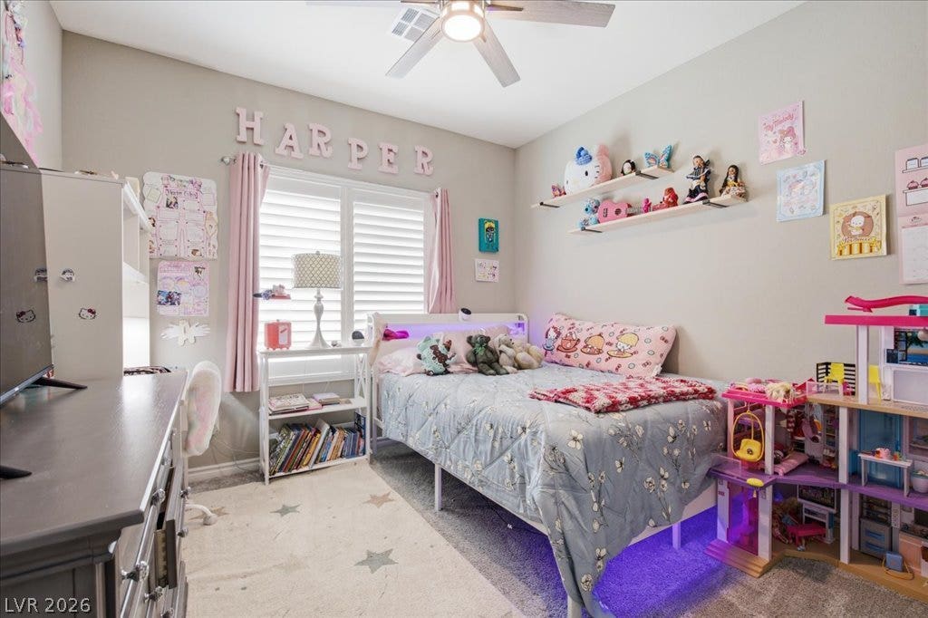 181 Elder View Drive, Las Vegas, NV 89138 A well-lit bedroom provides comfort and a charming ambiance.