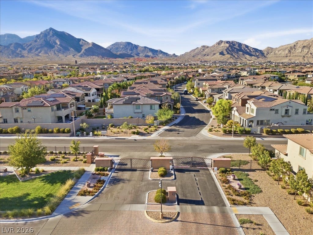 181 Elder View Drive, Las Vegas, NV 89138 Dramatic mountain peaks frame this secure residential neighborhood accessed via a gated entrance.