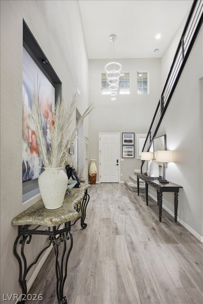181 Elder View Drive, Las Vegas, NV 89138 High ceilings and clean architectural lines define this welcoming entry with wood flooring.