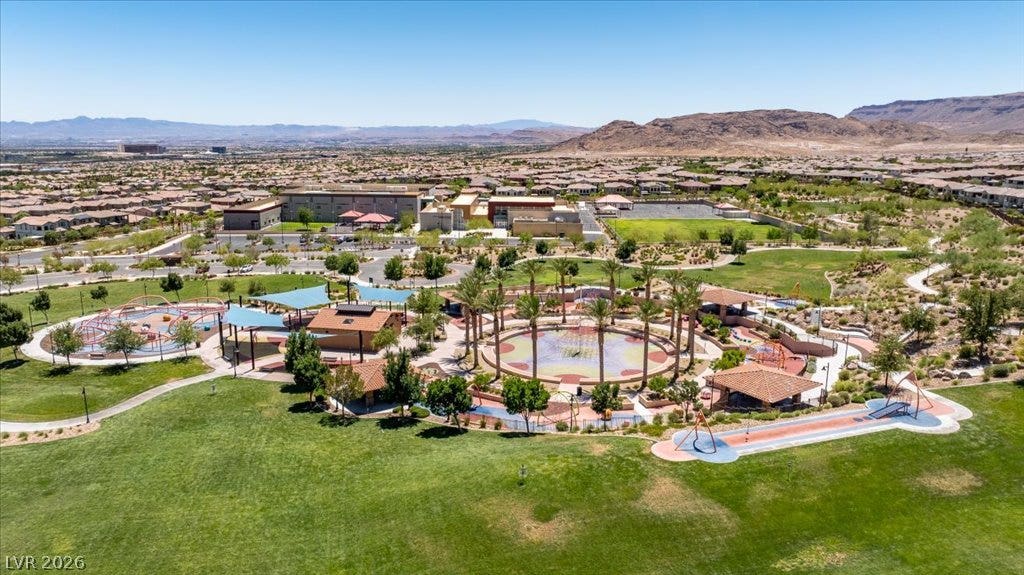 181 Elder View Drive, Las Vegas, NV 89138 An aerial perspective reveals a vibrant community park with extensive green spaces and engaging recreational facilities.