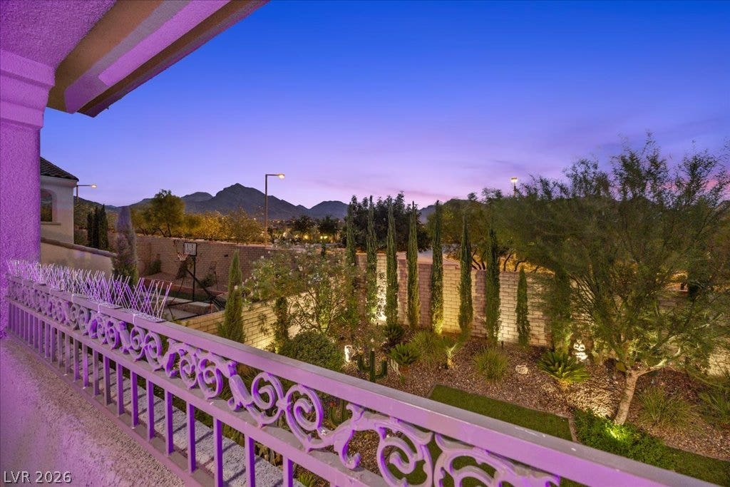 181 Elder View Drive, Las Vegas, NV 89138 Dusk skies provide a dramatic backdrop for the scenic mountain and desert landscape views.