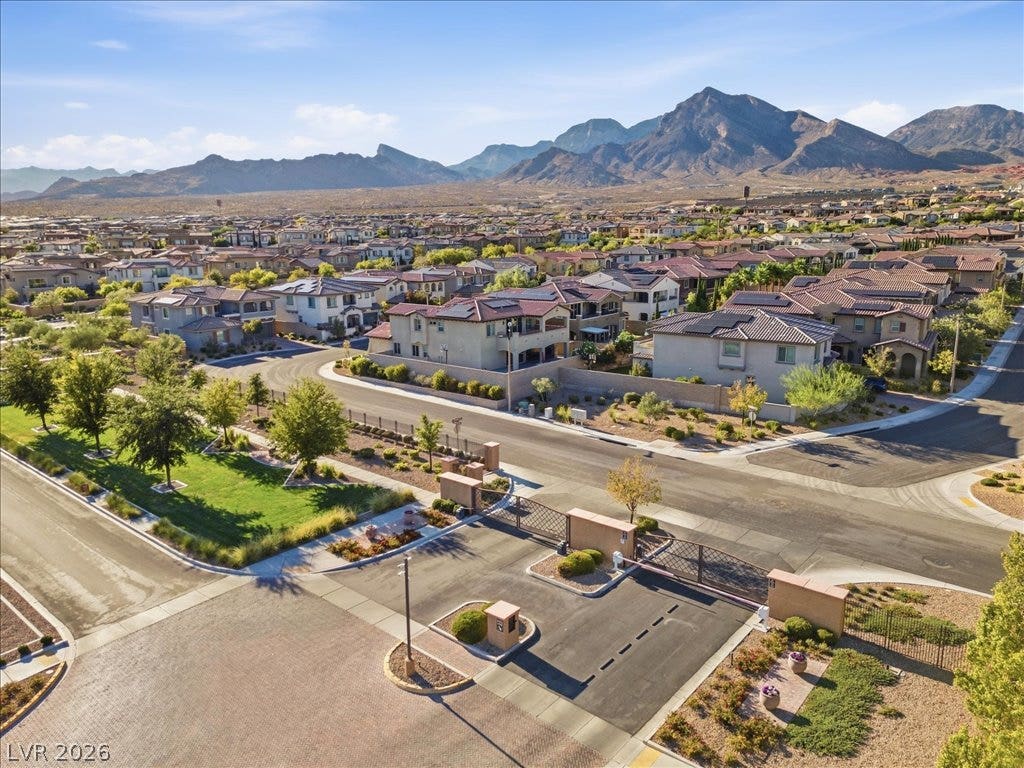 181 Elder View Drive, Las Vegas, NV 89138 A secure gated entrance welcomes you to this scenic neighborhood nestled against a mountain backdrop.