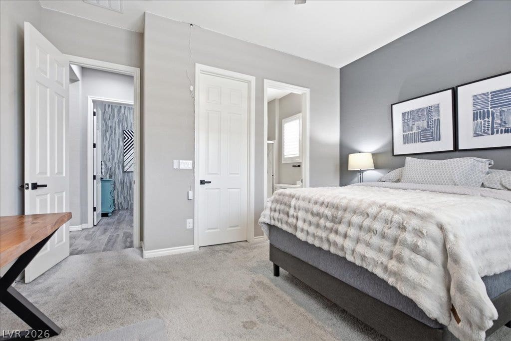 181 Elder View Drive, Las Vegas, NV 89138 Plush carpet and soft lighting create a serene atmosphere in this restful bedroom retreat.