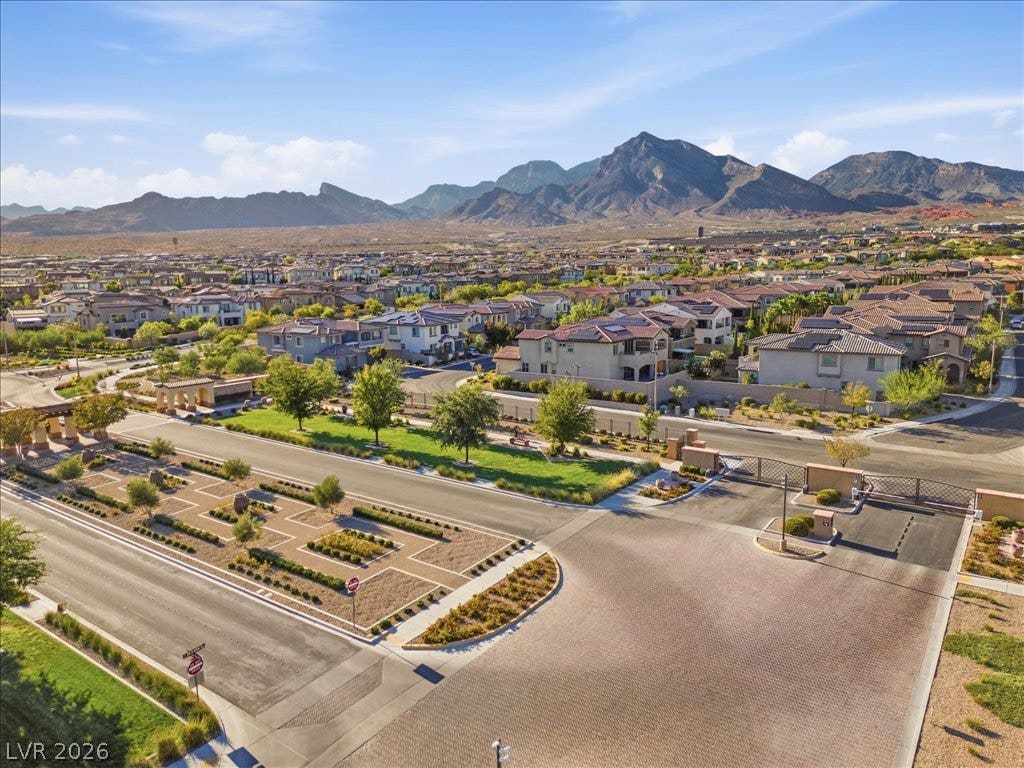 181 Elder View Drive, Las Vegas, NV 89138 A gated entrance opens to manicured streets with dramatic mountain backdrops.