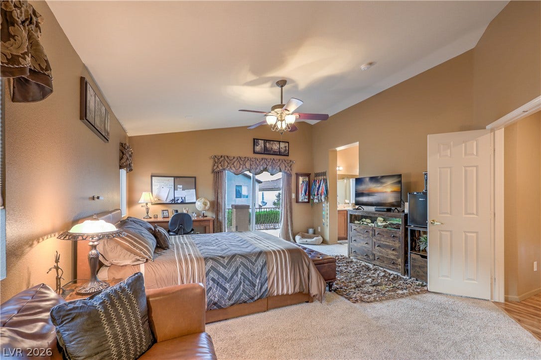 10474 Rustyville Court, Las Vegas, NV 89129 The Primary bedroom offers space for a large bed, dressers and a sitting area.