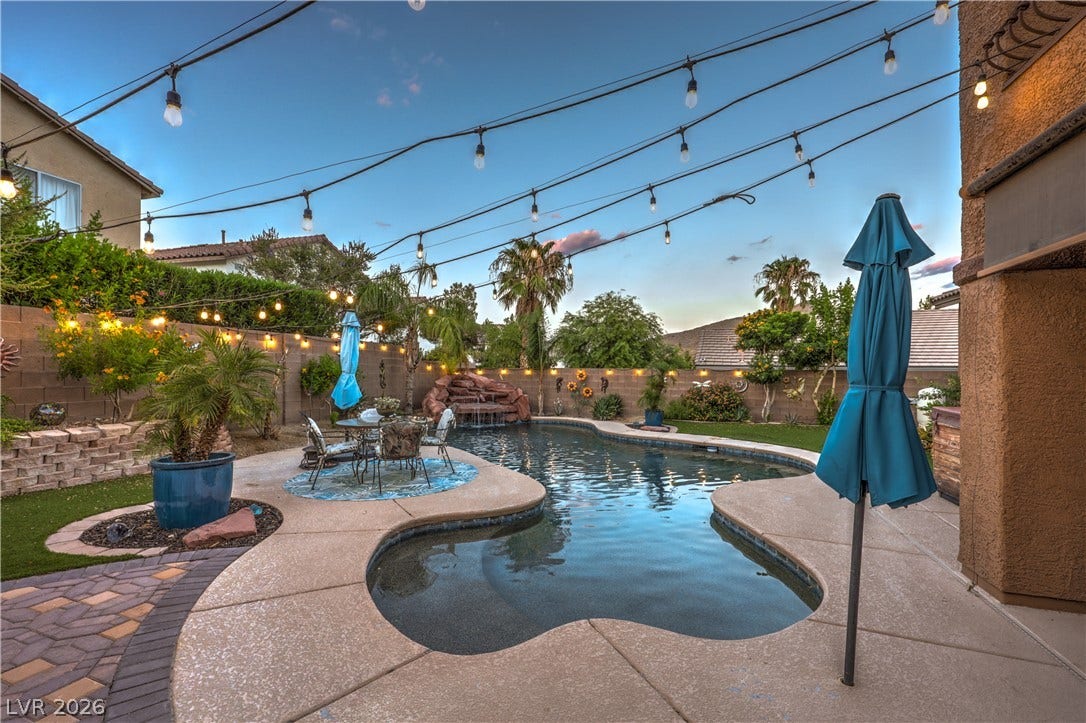 10474 Rustyville Court, Las Vegas, NV 89129 String lights illuminate the yard and can be set to bright or dimmer lighting for added relaxation.