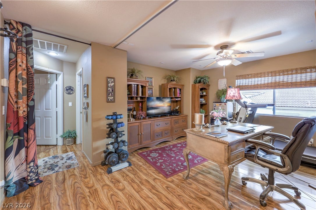 10474 Rustyville Court, Las Vegas, NV 89129 Spacious Loft provides added space for you to use in several ways. Ample natural light through a large window.