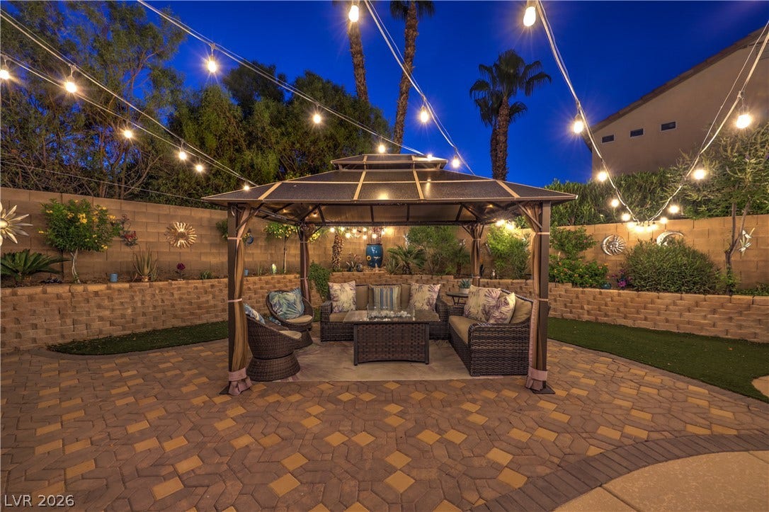 10474 Rustyville Court, Las Vegas, NV 89129 Lovely paver patio extension offers a separate pergola for more seating.