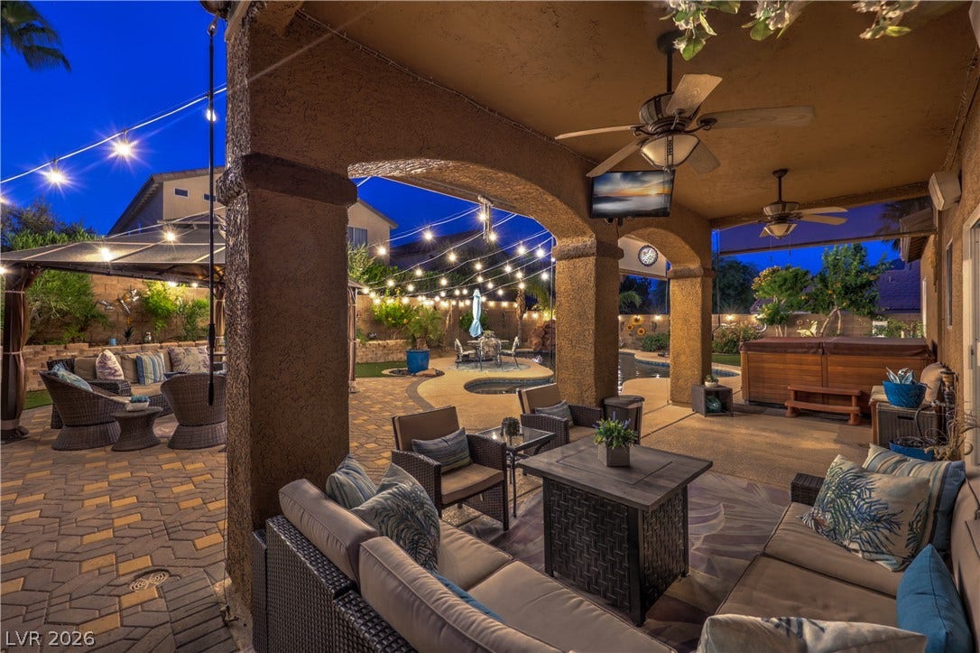10474 Rustyville Court, Las Vegas, NV 89129 The covered patio offers surround sound speakers, dual ceiling fans and space for a sectional couch.