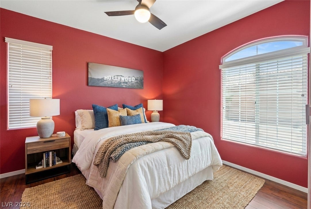 6163 Bayard Street, Las Vegas, NV 89148 Gleaming hardwood floors and a classic arched window create a highly welcoming atmosphere.