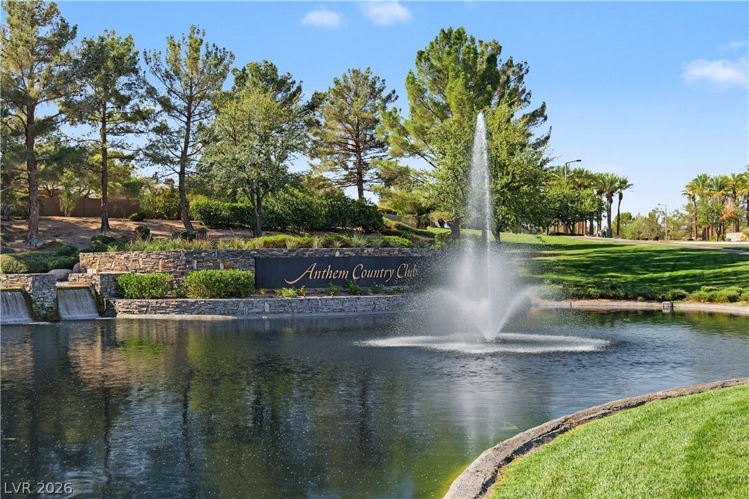 6 Mohansic Road, Henderson, NV 89052 A tranquil pond and majestic water fountain anchor the scenic community entryway landscape.