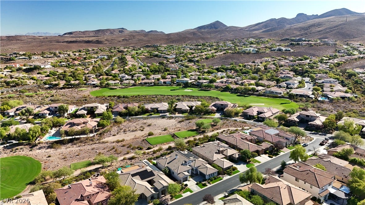 6 Mohansic Road, Henderson, NV 89052 A striking neighborhood nestled against a scenic mountain backdrop.