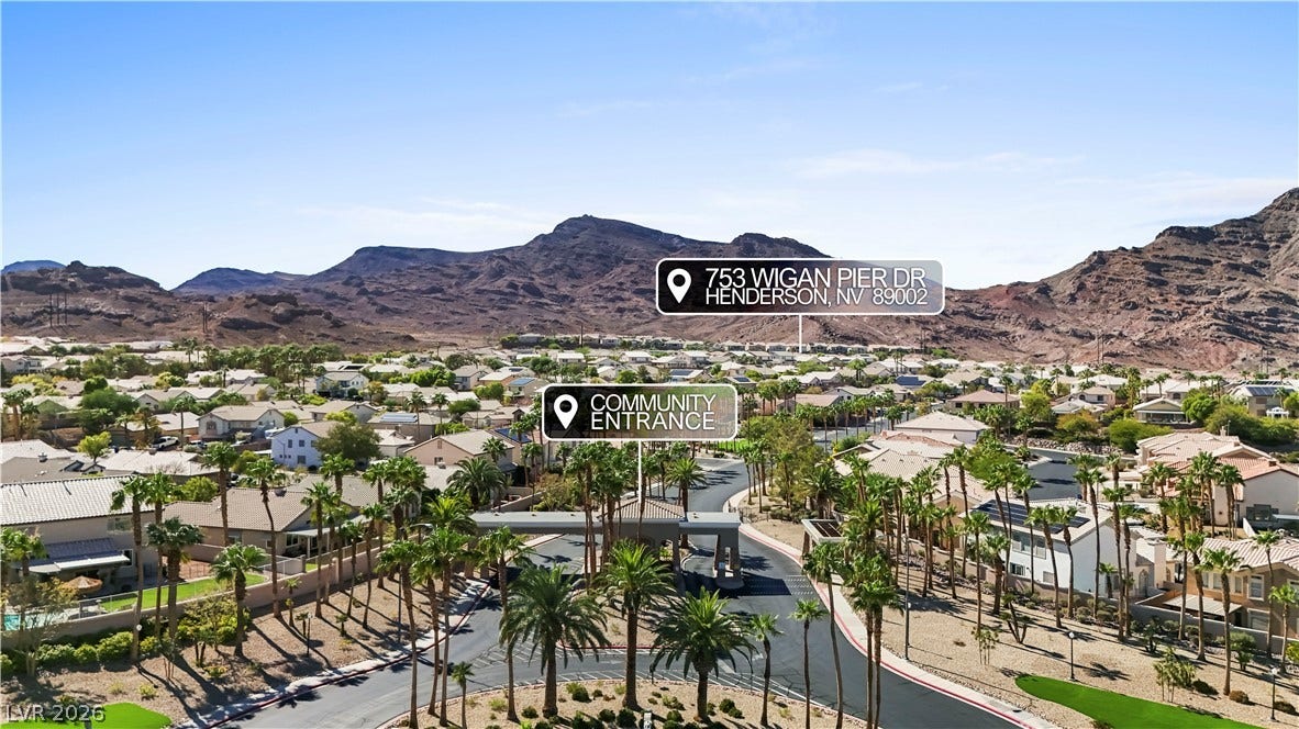 753 Wigan Pier Drive, Henderson, NV 89002 Dramatic mountain backdrops frame this peaceful residential neighborhood with palm-lined streets.