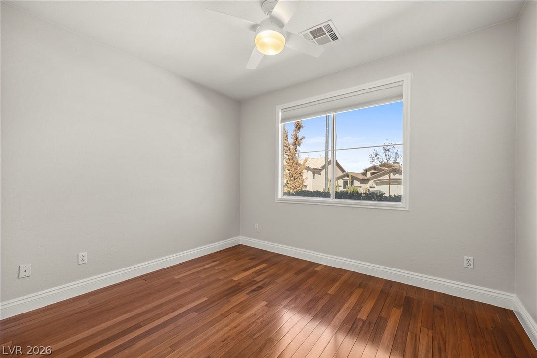753 Wigan Pier Drive, Henderson, NV 89002 Gleaming hardwood floors run throughout this versatile room under a bright window.