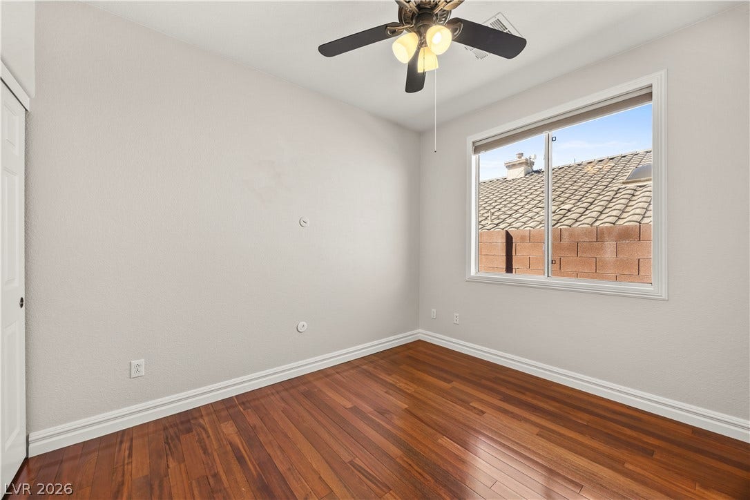 753 Wigan Pier Drive, Henderson, NV 89002 Rich hardwood flooring pairs beautifully with crisp white baseboards and abundant natural light.