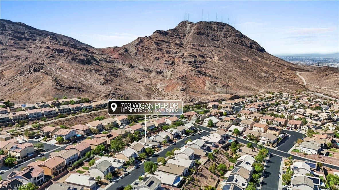 753 Wigan Pier Drive, Henderson, NV 89002 Dramatic desert mountains provide a majestic backdrop to this quiet suburban neighborhood.